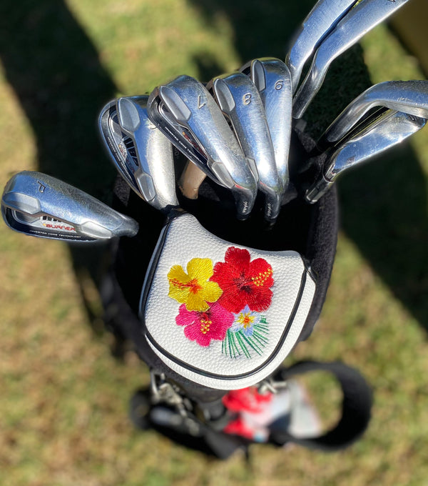 giggle golf tropical (flower) mallet on a putter in a golf bag