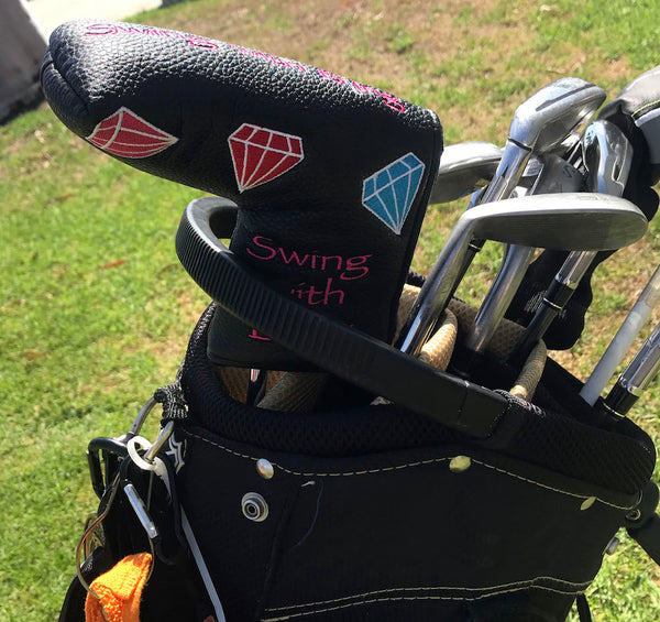 swing with bling blade putter cover on golf bag side 2