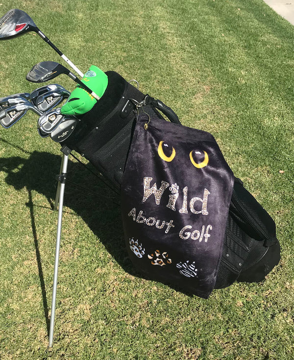 wild about golf towel on a golf bag